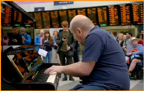 Pianist and composer Matthew Performing 'Tide of Dreams' at Biringham New Street Station on 'The Piano' Channel 4