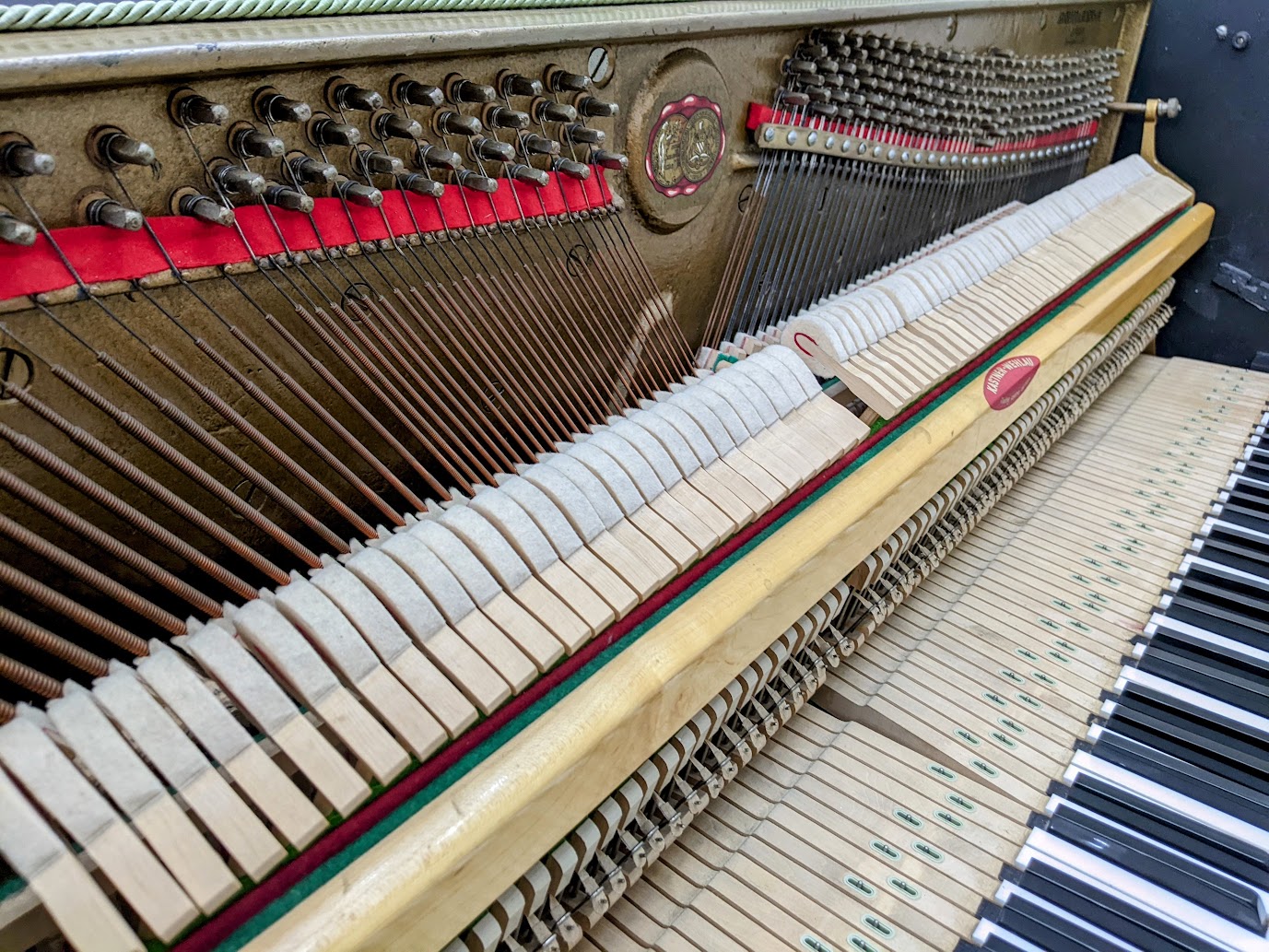 Close up of action on the Barratt & Robinson Upright Piano