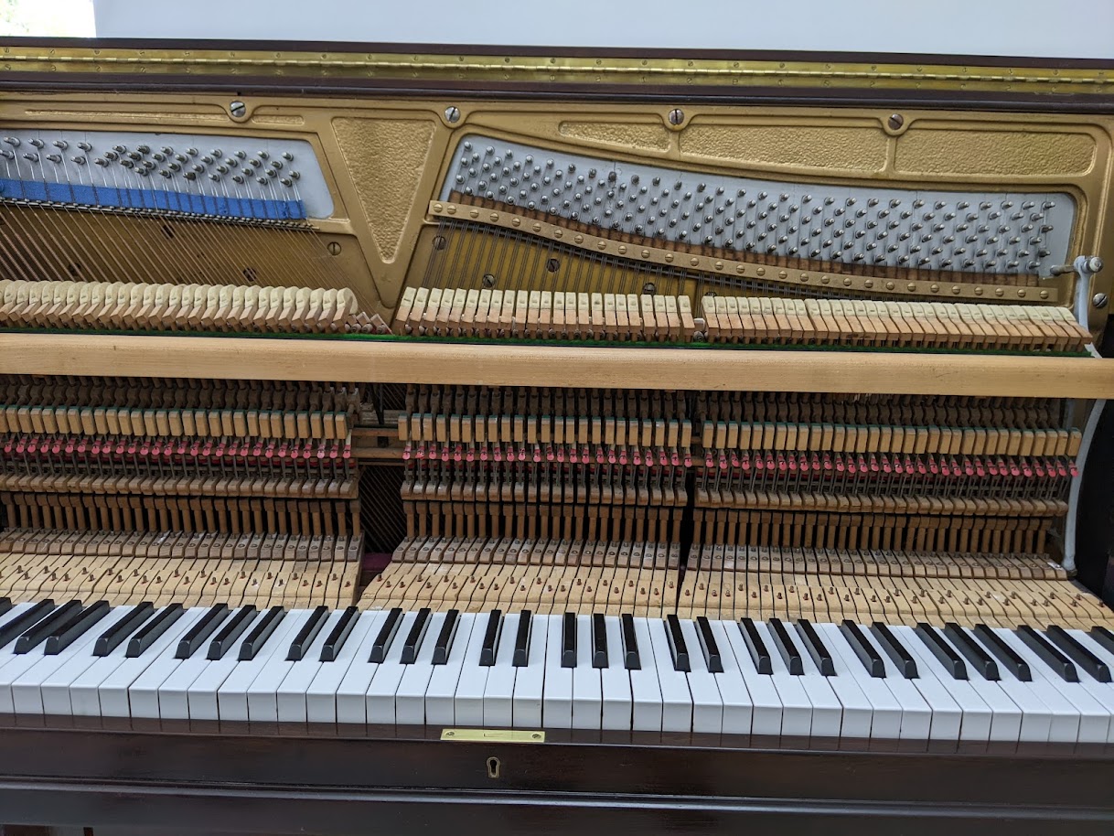 Close up of action on the Ernst Krauss Upright Piano