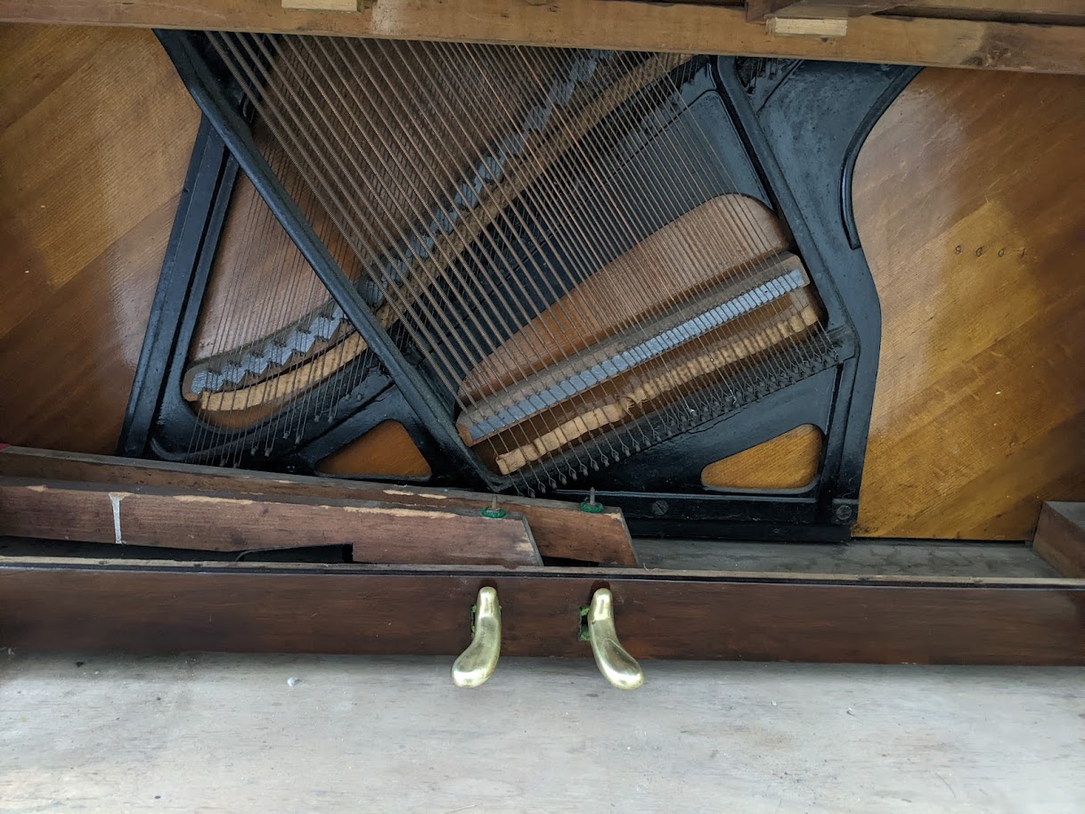 Close up of trap work and pedals on the Ernst Krauss Upright Piano