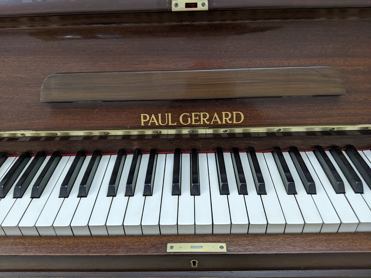 Paul Gerard Upright Piano Logo and keys