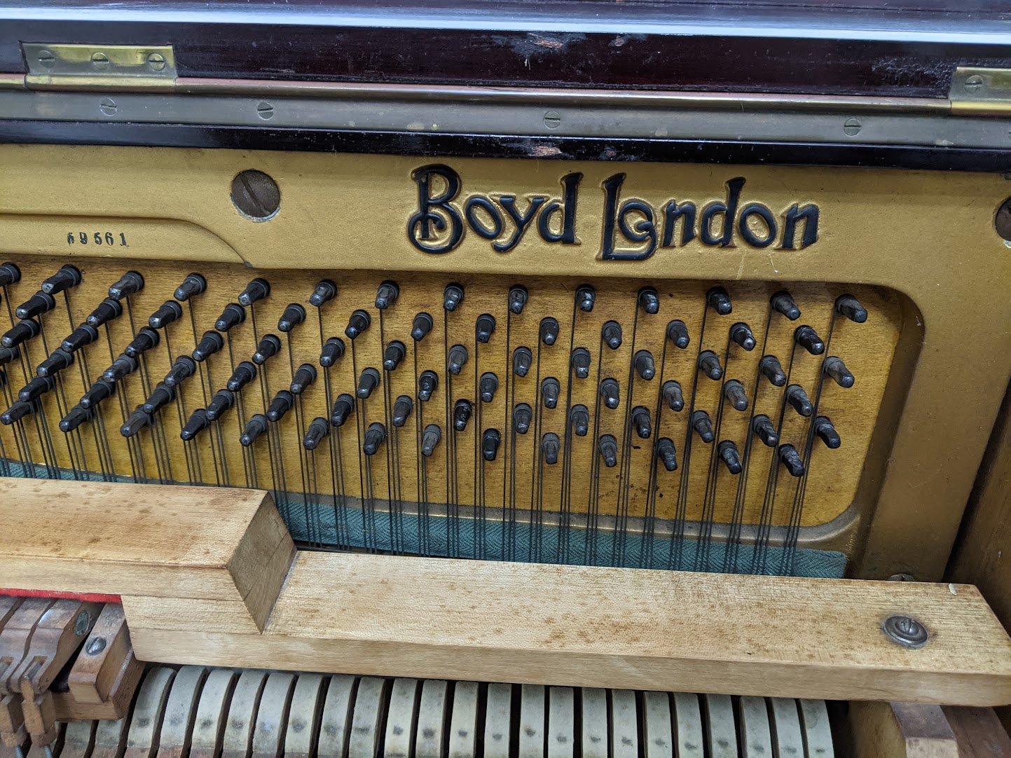 View of Iron frame of the c1930 Boyd Upright Piano