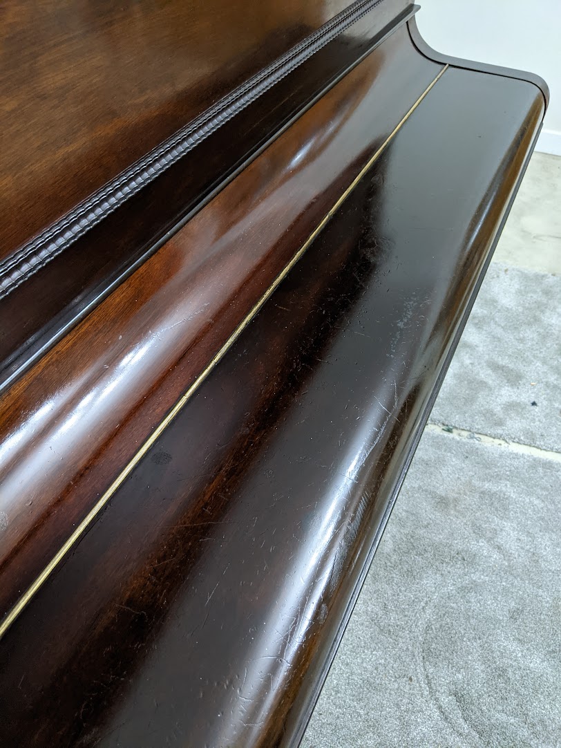 View of the 1930s Boyd Upright Piano with lid closed