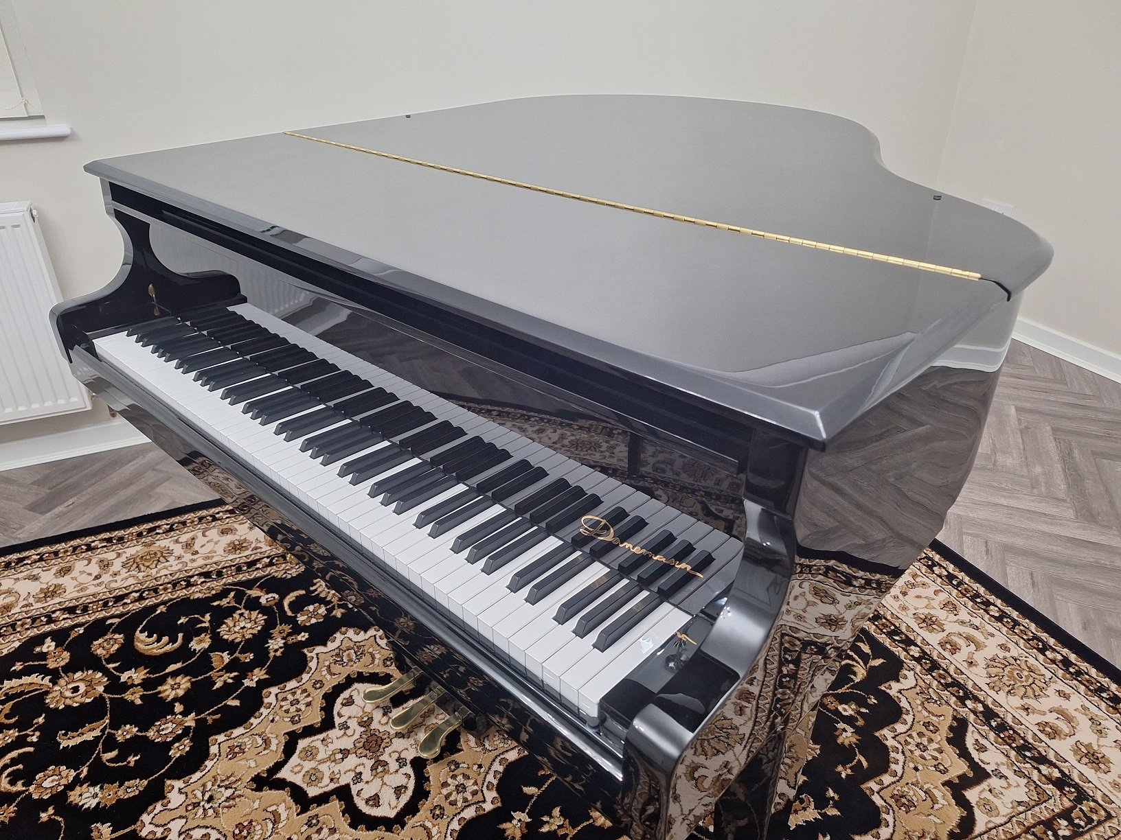 side view of the Danemann 160 Grand Piano