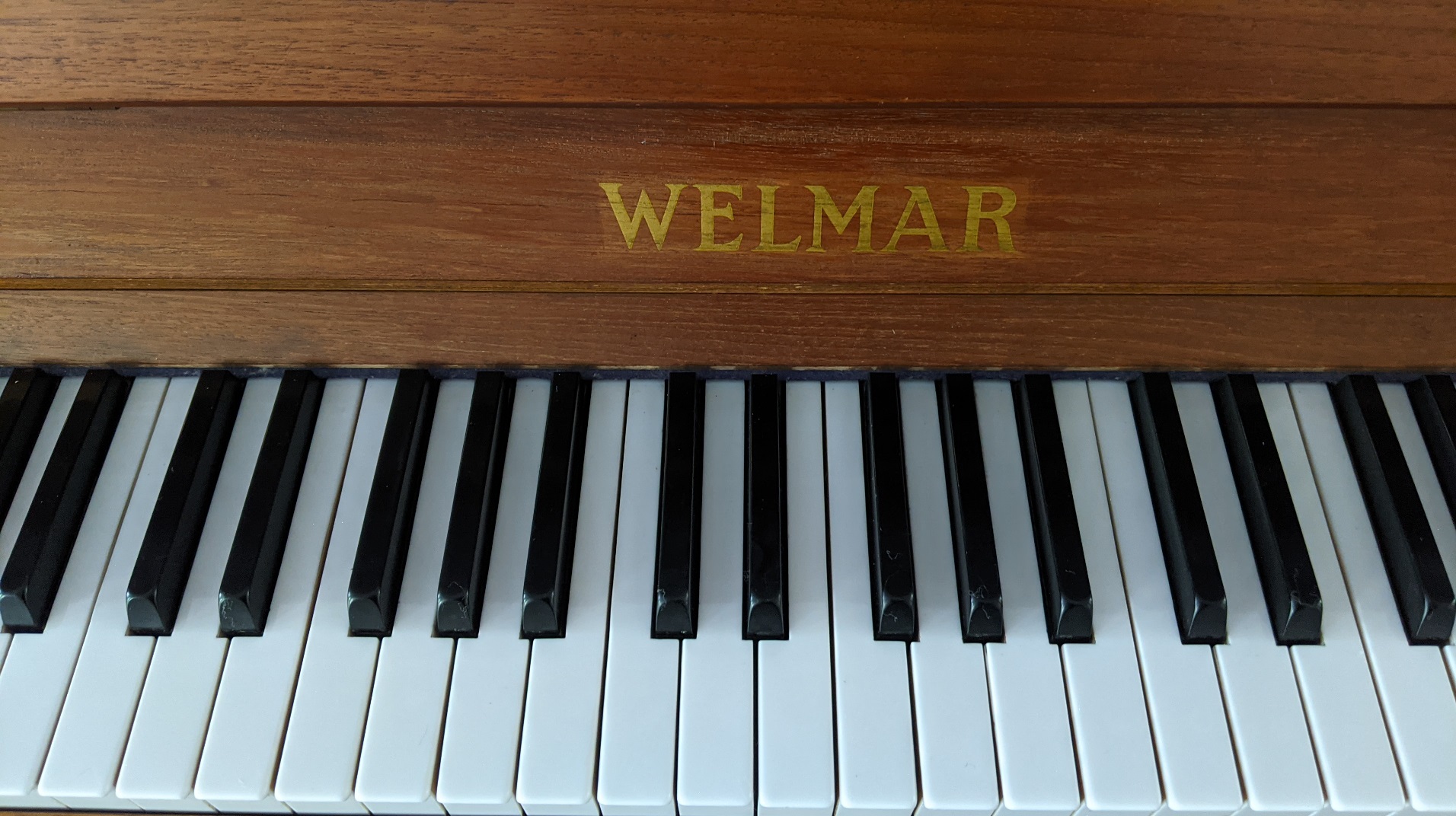 View of keys and decal  of the Welmar Upright Piano (c1973)